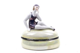 Art Deco lustre trinket box. Modelled with a bather.
