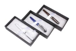 Three Diplomat Excellence fountain pens. Various designs, cased and boxed.
