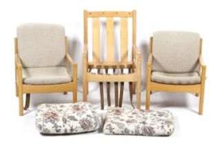 A set of three mid-century Ercol open armchairs.