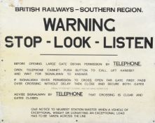 A vintage British Railways Southern Region metal warning sign.