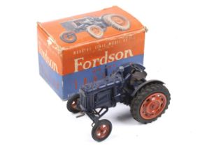 A Chad Valley diecast Fordson Major E27N major tractor. Complete with crank and in original box.