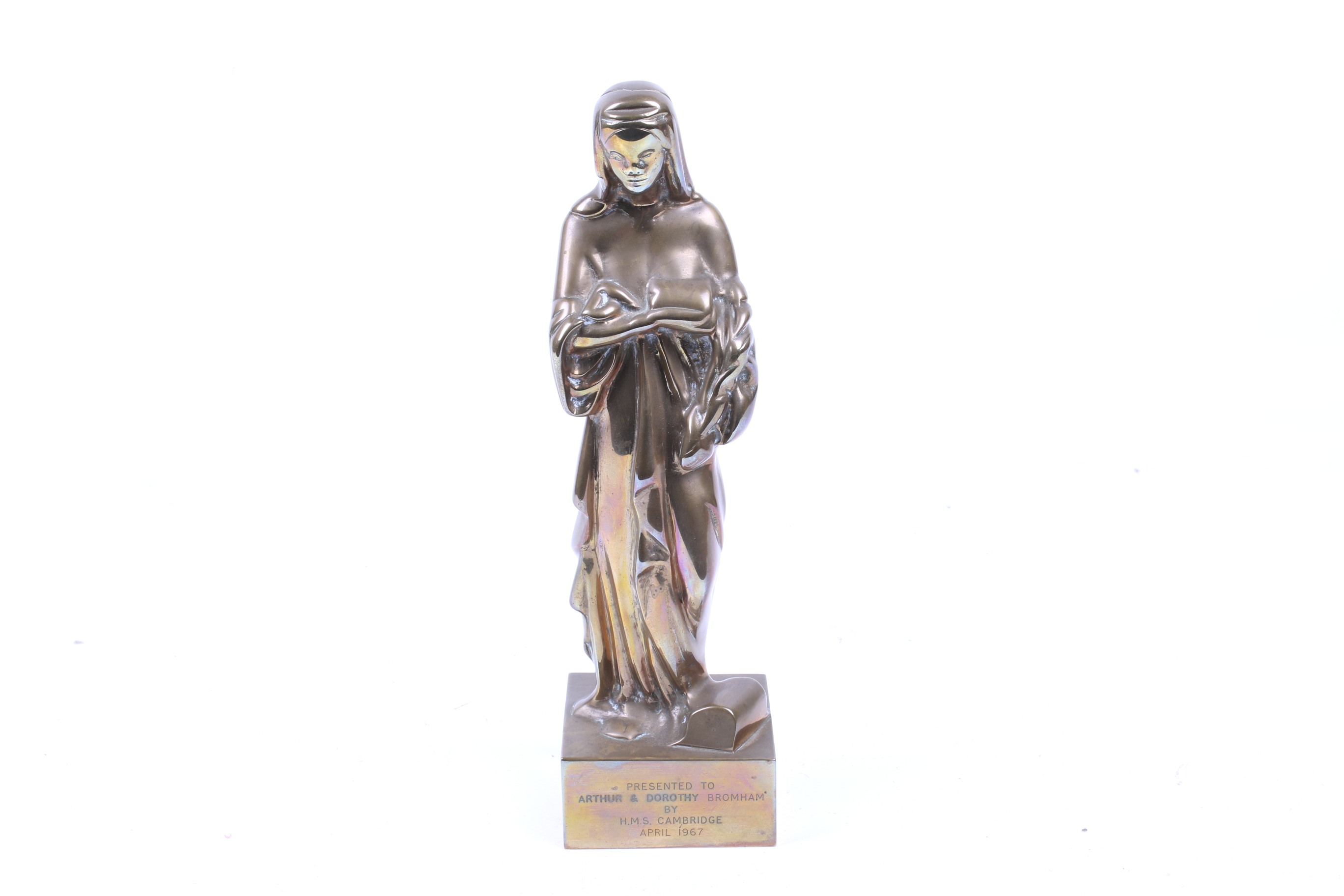 A bronze model of the Virgin Mary. Marked 'Presented to Arthur & Dorothy Bromham by H.M.S.