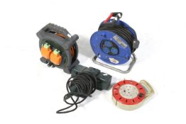 Four extension power cable reels.