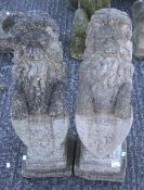 A pair of composite stone lions.