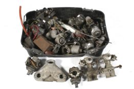 A quantity of vintage carburetors.