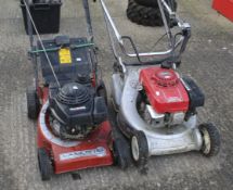 Two petrol lawnmowers. Including a Honda HR194 and a Mountfield Laser.