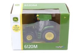 A Britains 1:32 scale John Deere 6120M tractor.