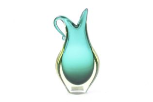 A mid-century Murano style encased glass pitcher vase.