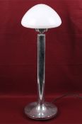 A mid-century Durlston Designs chrome table lamp. Having an opaque white glass dome shade.
