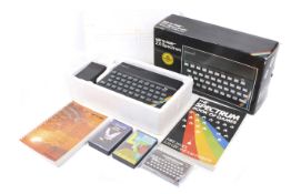 A vintage Sinclair ZX Spectrum Personal Computer and games.