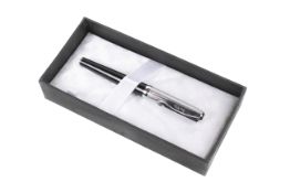 A Diplomat Excellence black and chrome fountain pen. Stamped 14K nib, cased and boxed.
