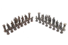 A vintage metal chess set. The pieces modelled as ancient Greek style soldiers, 'King' H9.