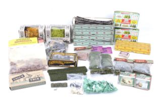 An assortment of model railway accessories.