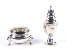 An Edwardian silver vase shaped pepper pot and a later cauldron shaped salt cellar.