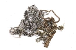 A collection of silver and white metal fobs, bracelets and other items.