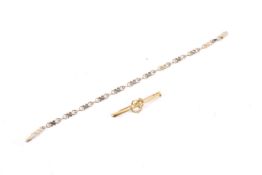 A vintage Italian 9ct gold 'Hearts and Kisses' bracelet.