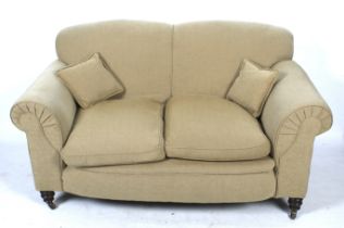 A two seater drop end sofa.