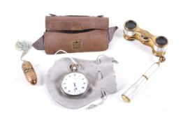 A pocket watch and other items.