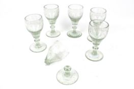 A set of six 19th century American green hand-blown glasses.