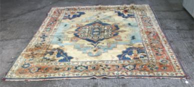 A large Turkish style wool rug.