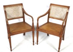 A pair of 20th century bergere chairs.