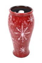 An Anita Harris signed studio pottery 'Snowflake' vase. H17.