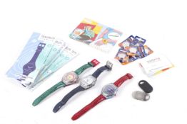 An collection of contemporary wristwatches and accessories.