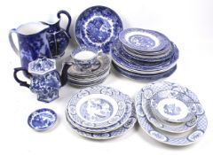 A large collection of blue and white transfer ceramics.