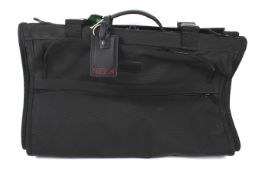 A Luggage Tumi Alpha Bi-Fold garment suit bag. 236D3.