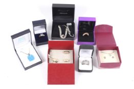 Seven pieces of silver jewellery.