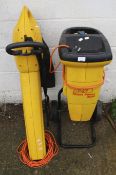 A garden wood shredder and a blower.