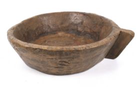 A hand-carved wooden bowl.