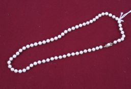 A modern cultured-pearl single row necklace.