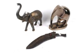 Two contemporary elephant figures and a Nepalese kukri.