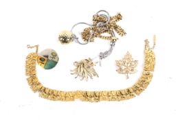 A collection of vintage designer named costume jewellery.