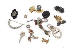 A collection of Victorian and later brooches.