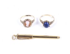 Two vintage 9ct gold and gem rings and a gold-plated pendant biro.