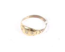 A late Victorian gold and tiny diamond three stone gypsy ring.