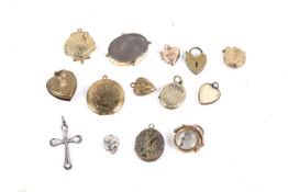 A collection of Victorian and later lockets and other items.