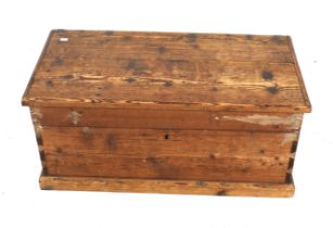 A pine blanket box. With twin handles, on a plinth base, H41cm x W94cm x D47.