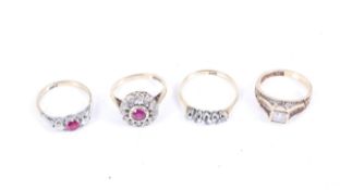 A group of four 9ct gold dress rings set with synthetic rubies and white stones.