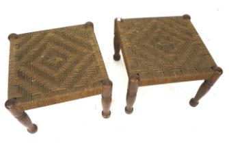 A pair of wooden framed foot stools.