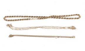 Three 9ct gold necklaces including a rope necklace.