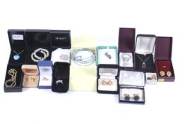 A group of twenty boxed items of jewellery including rings, necklaces and bracelets.