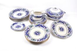 A Minton dinner service in the 'Chinese Dragon and Bird' pattern.