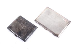 Two Edwardian silver cigarette cases.