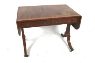 A Victorian vennered sofa table.