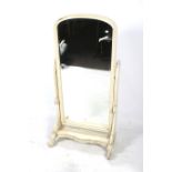 A bevelled edge cheval mirror. The frame painted white, raised on cabriole supports, H157cm x W76.