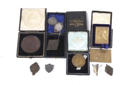 A small quantity of early 20th century sporting prize medallions.