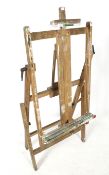 A Winsor & Newton full sized artist's oil acrylics folding wooden easel.